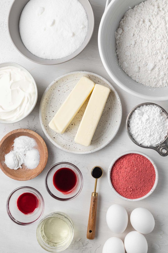 An overhead view of the ingredients needed to make pound cake with strawberry glaze. 