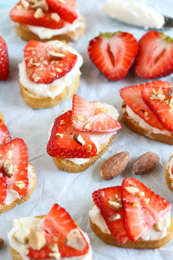 These Strawberry, Almond, and Whipped Honey Goat Cheese Crostini are so easy to make and perfect for summer entertaining!