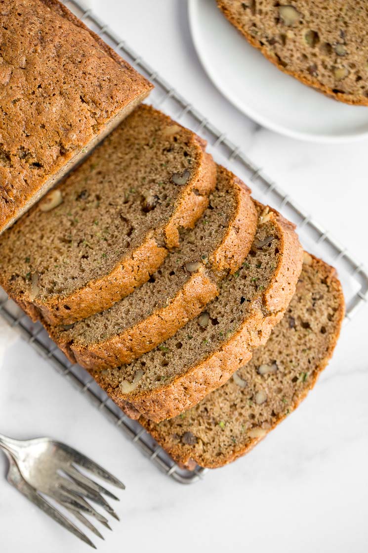 An overhead picture of a sliced zucchini bread.